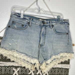 Free People with Lace hem Distressed Denim Shorts 
Size W 29